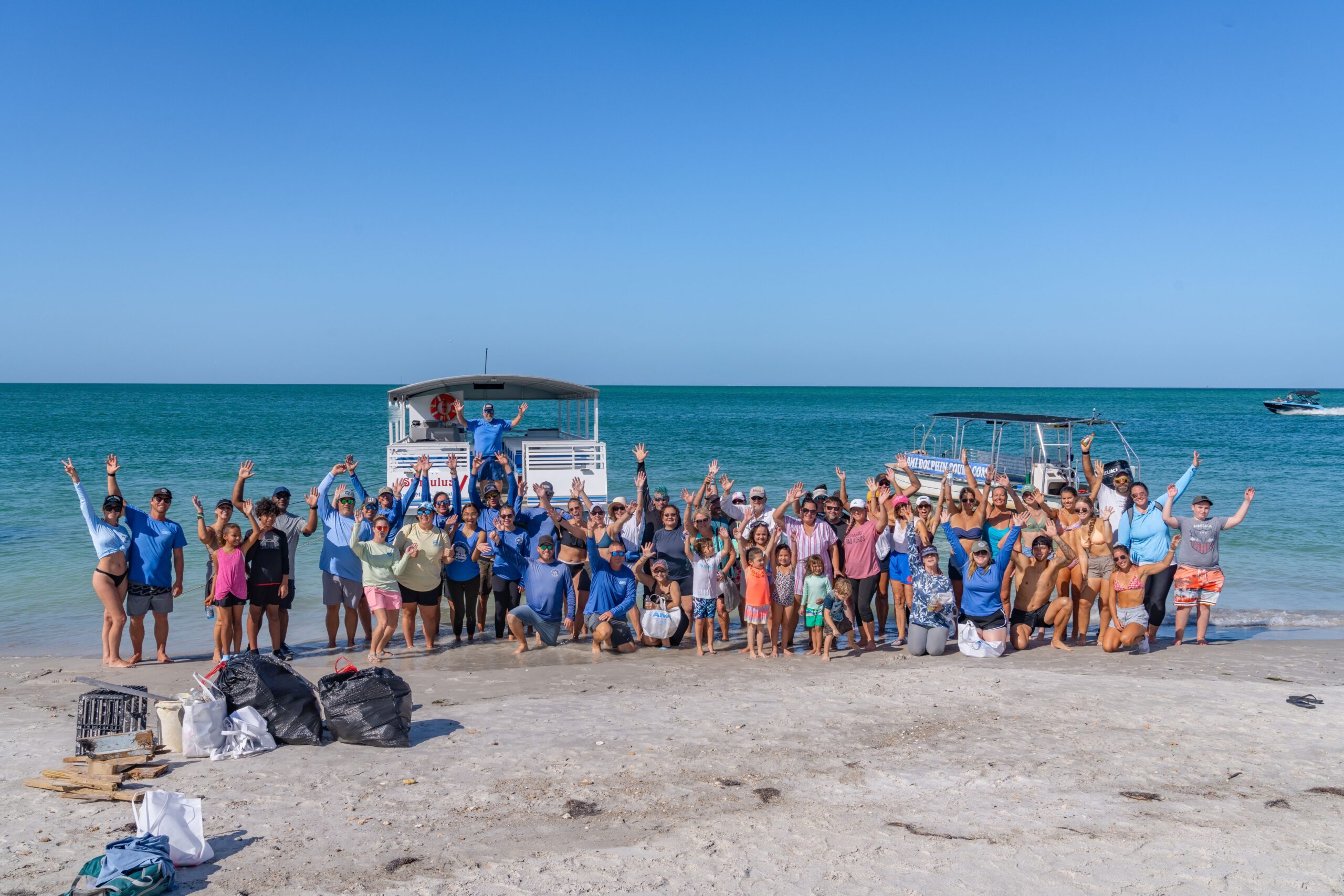 a group of people on a beach